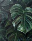 A square canvas painting of green monstera leaves, displayed on a plain off-white wall.